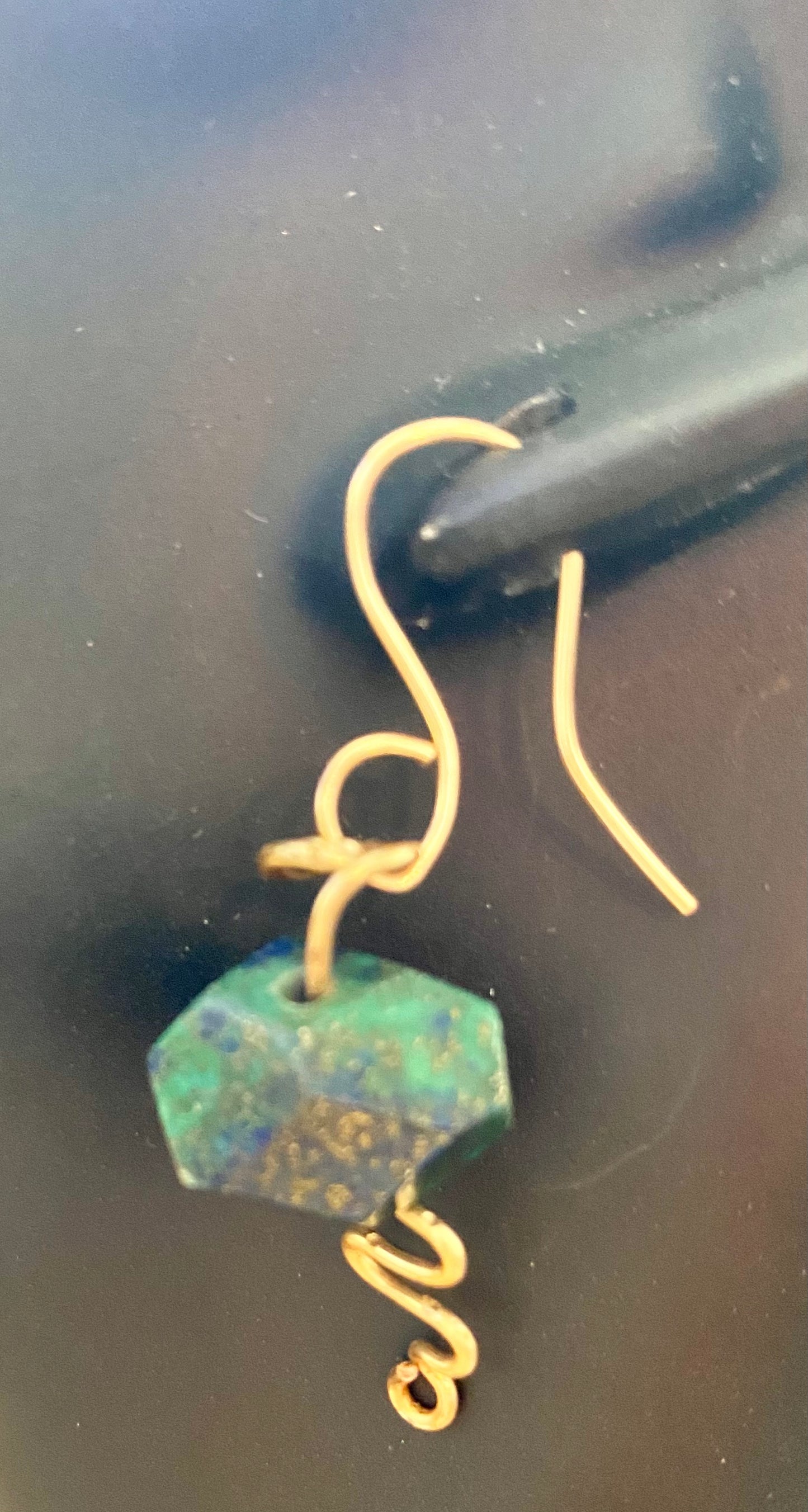 Entirely unique and luxurious, these earrings are exquisitely constructed of Chrysocolla stones and 24k gold plated copper.