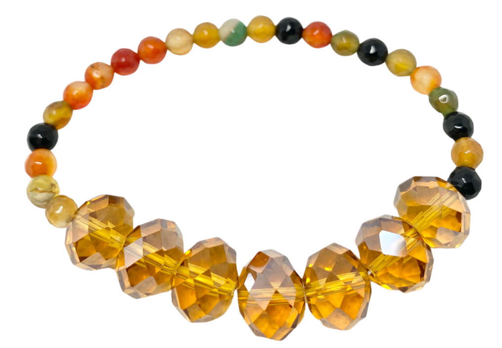 Agate is known to bring serenity, safeguard against life's obstacles, and sharpen focus. This stretch bracelet is made with a variety of hues, including brown, bla