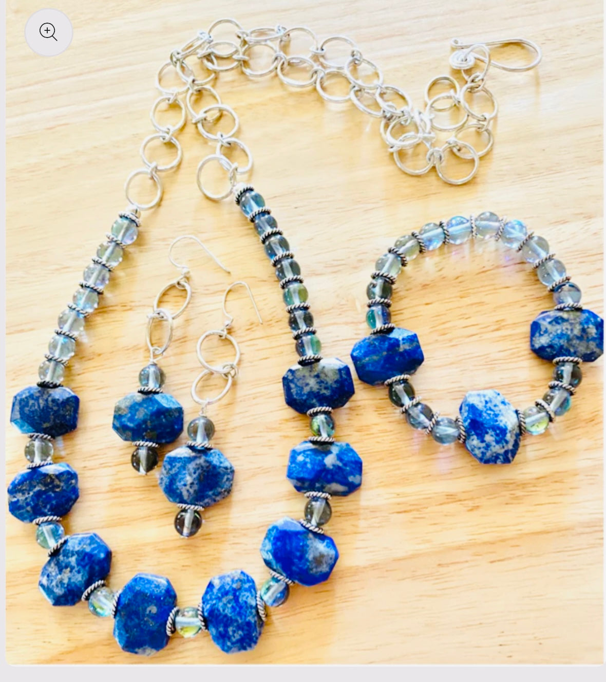 The pieces are crafted with care and feature a combination of gemstones, sterling silver, sodalite, and opalite.
The adjustable necklace measures between 14 to 24 in