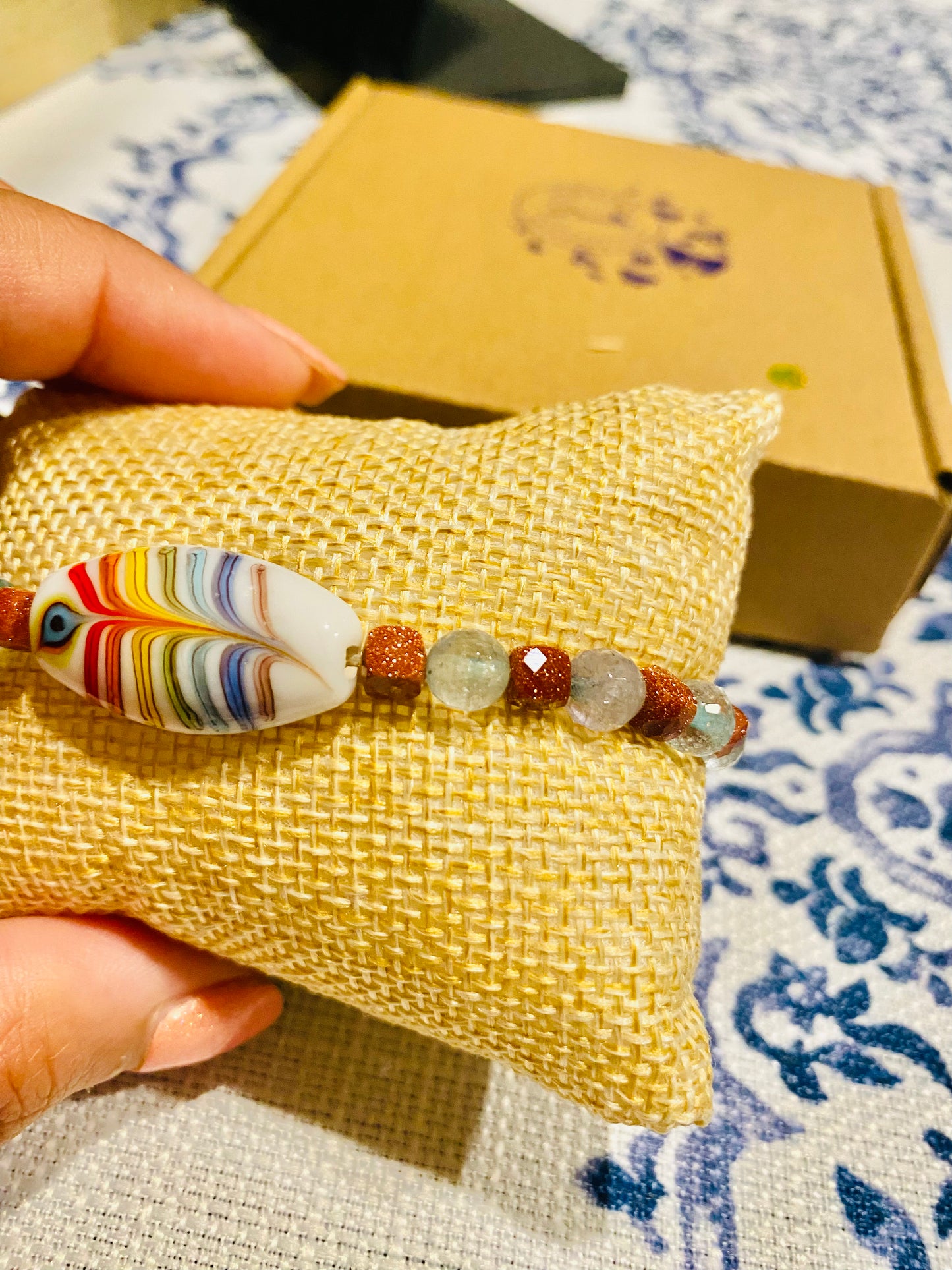 Glistening Goldstone and aquamarine, crafted into a stretchable bracelet - perfect for gifting or for yourself! And with free U.S shipping on orders over $25, you