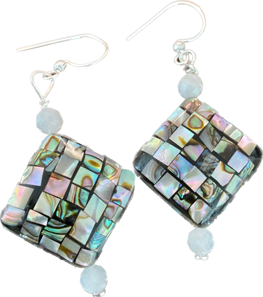 Crafted from seashell and moonstone, these statement earrings boast an understated yet weightless quality, alluding to the size of a quarter. Pendanting from a ste